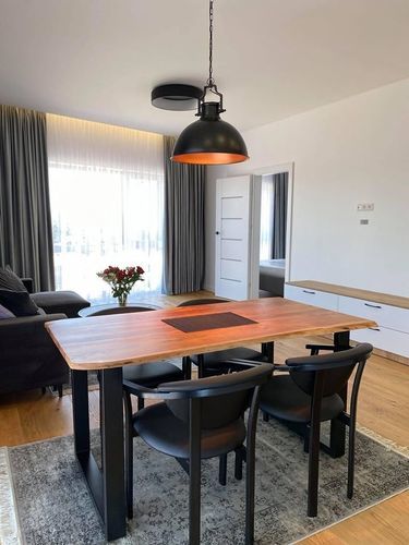 Tavolo da pranzo contemporaneo - RIO - Meubles des Carpates - in rovere / con supporto in metallo / rettangolare