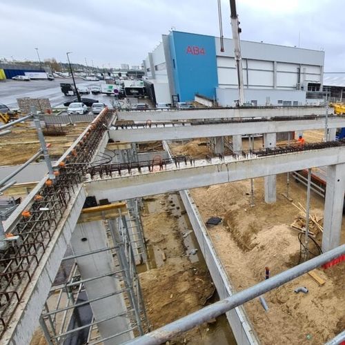 Trave in calcestruzzo prefabbricato - Groupe Saint Léonard - a sezione rettangolare / per solaio / per edifici
