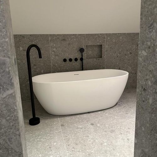 Vasca da bagno ovale - IKTO Design - da appoggio / per ambiente abitativo / in pietra