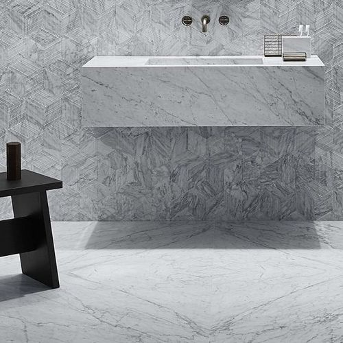 Lavabo sospeso - STILETTO - Salvatori - in pietra naturale / con piano integrato / su misura