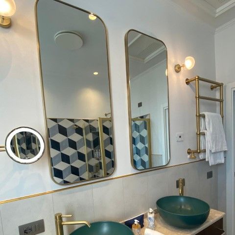 Specchio da bagno sospeso - POLLUCE - MONTELEONE - per hotel / contemporaneo / rettangolare