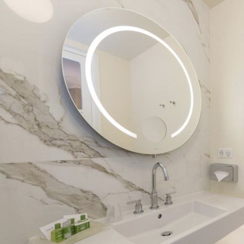 Specchio da bagno rotondo - SADIR - MONTELEONE - a muro / per hotel / per camera d'hotel