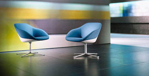 Poltrona contemporanea - TURTLE LOUNGE - Walter Knoll - in pelle / in tessuto / con base a stella