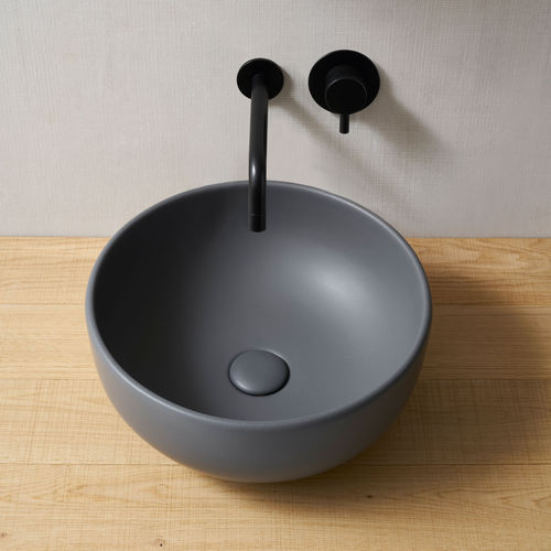 Lavabo da appoggio - SHUI - CEMENTO - Ceramica Cielo - in ceramica / rotondo / contemporaneo