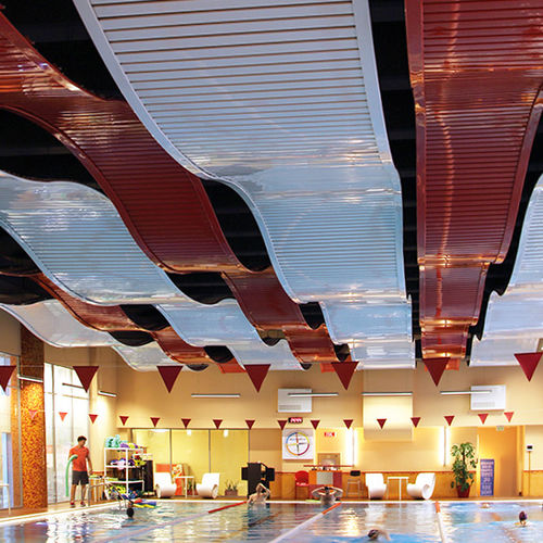 Controsoffitto in metallo - Luxalon® Curved Carrier - Hunter Douglas Architectural - in pannelli / per ufficio / per sala conferenze