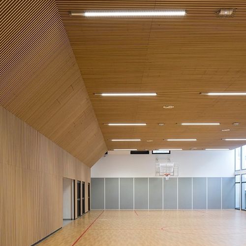 Rivestimento murale acustico - Derako® Veneered Grill Wall - Hunter Douglas Architectural - per interni / impiallacciato in legno / liscio