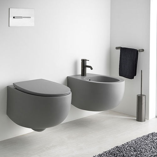 WC sospeso - S555 - A. e T. ITALIA - in ceramica / per uso residenziale / ovale