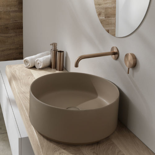 Lavabo da appoggio - L625 - A. e T. ITALIA - in ceramica / rotondo / senza foro