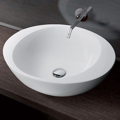 Lavabo da appoggio - ACCENT - A. e T. ITALIA - in ceramica / ovale / senza foro