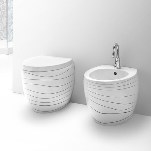 WC da appoggio - S541 - A. e T. ITALIA - in ceramica / per uso residenziale / ovale