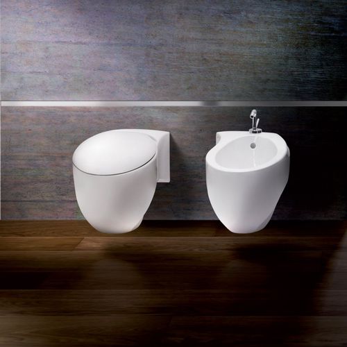 WC sospeso - S531 - A. e T. ITALIA - in ceramica / per uso residenziale / ovale
