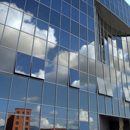 Facciata continua in pannelli - POLIEDRA-SKY 60 - METRA Building - in alluminio e vetro / acustica / a specchio