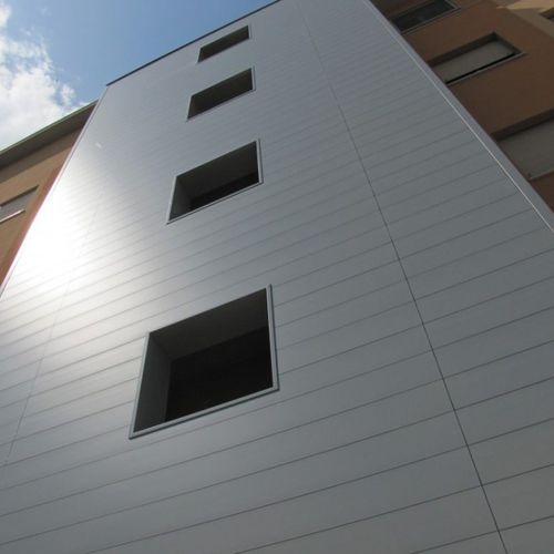 Rivestimento di facciata in pannelli - XLINE - PROMOCLAD - in alluminio / liscio / di grande formato