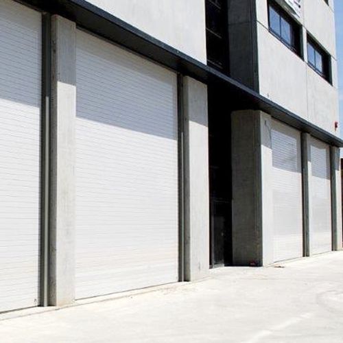Porta industriale sezionale - EST&Aacute;NDAR - Manusa - in poliuretano / in acciaio / isolante