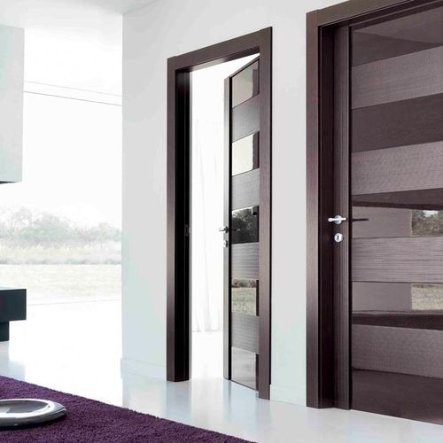 Porta da interno - PRESTIGE  - ROMAGNOLI - in legno / in pelle / a bilico con asse laterale