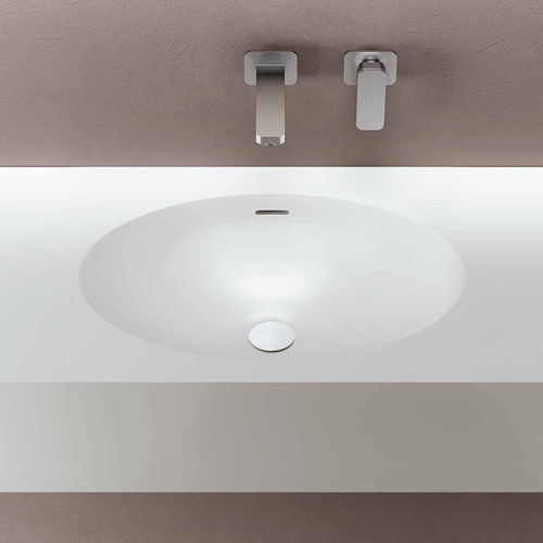 Lavabo integrato - DROP - PLANIT - in Corian® / con piano integrato / ovale