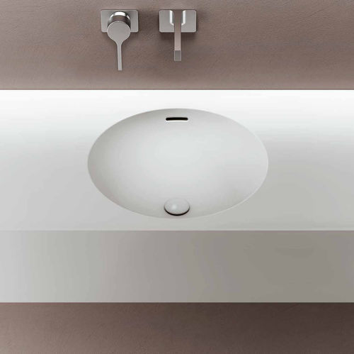 Lavabo integrato - IBIS - PLANIT - in Corian® / con piano integrato / rettangolare