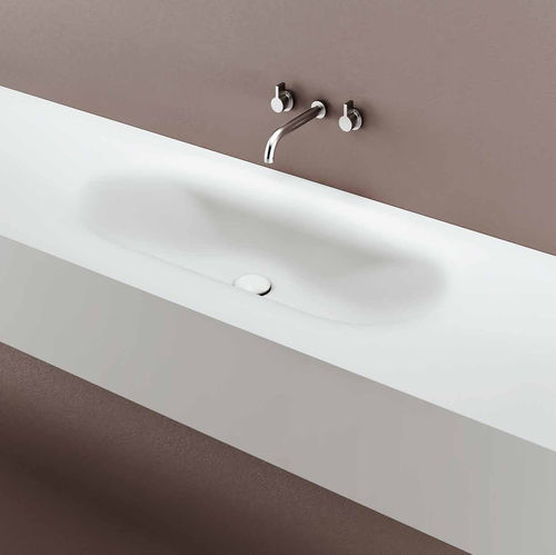 Lavabo integrato - MOBY - PLANIT - in Corian® / con piano integrato / ovale
