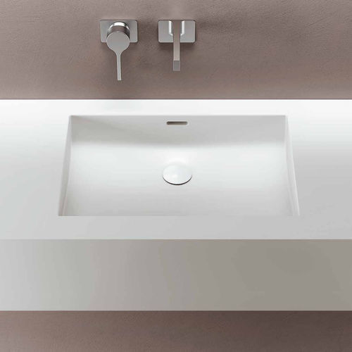 Lavabo integrato - PLANIVIT - PLANIT - in Corian® / con piano integrato / per disabili