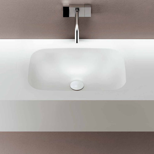 Lavabo integrato - STELLA - PLANIT - in Corian® / con piano integrato / su misura