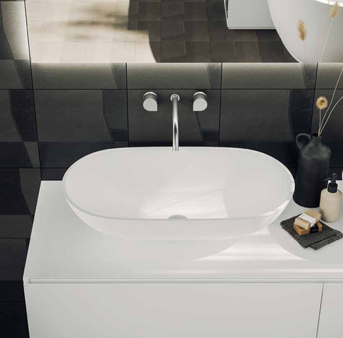 Lavabo da appoggio - CONCAVE - PLANIT - in Corian® / ovale / senza foro