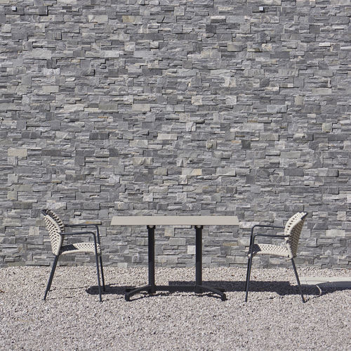 Tavolo contemporaneo - DAKOTA - DRIGANI SRL - in HPL / in pietra / con supporto in ghisa