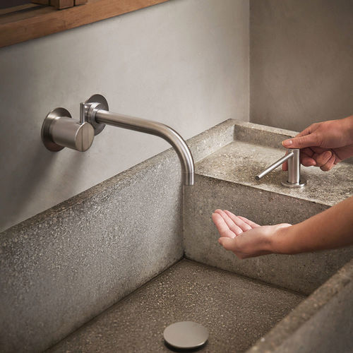 Miscelatore per lavabo - 111 series - VOLA - da parete / in acciaio inossidabile / da bagno