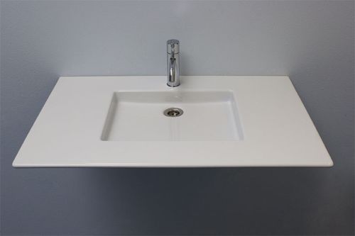 Lavabo sospeso - ALBEUS - Rapsel International Srl - in ceramica / con piano integrato / rettangolare