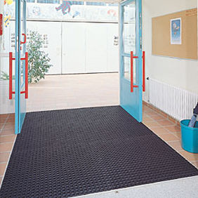 Tappeto d'ingresso per edifici pubblici - DOMINO® - GRIDIRON S.P.A. - Unipersonale - in gomma / su misura / anulare