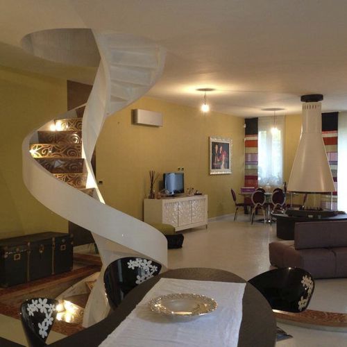 Scala elicoidale - ELI CA 05 - RIZZI - con gradini in metallo / con struttura in calcestruzzo / per uso residenziale