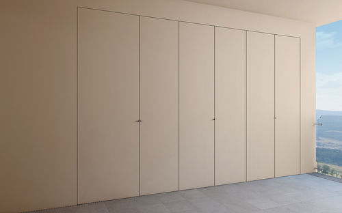 Porta per armadio in legno massiccio - FILOPARETE - CIPRIANI SERRAMENTI - in alluminio / battente / senza vetri