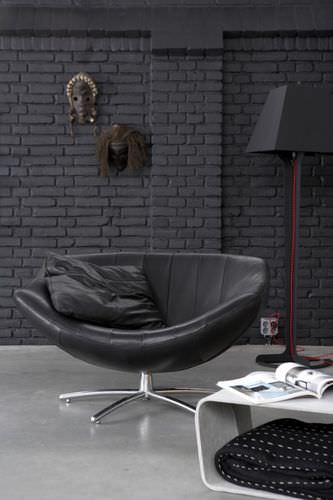 Poltrona contemporanea - GIGI - Label Produkties bv - in pelle / con poggiapiedi / con base a stella