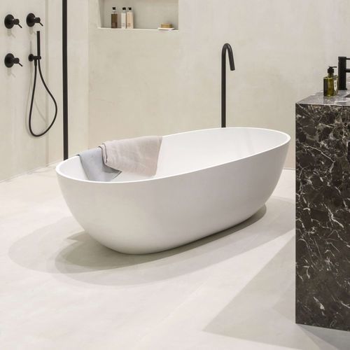 Vasca da bagno ovale - AMBOINE  - Condor - ad isola / per ambiente abitativo / in Solid Surface