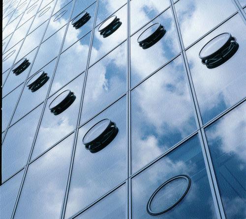 Facciata continua in pannelli - UPTOWN MUNCHEN - Josef Gartner - in metallo e in vetro / a controllo solare