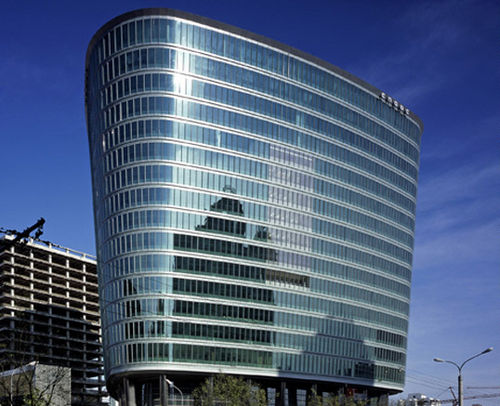 Facciata continua a cellule - CNOOC BUILDING - Josef Gartner - in alluminio e vetro / tagliafuoco / trasparente