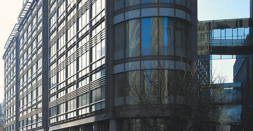 Facciata continua in pannelli - FLEET STREET - Permasteelisa - in pietra / in metallo e in vetro