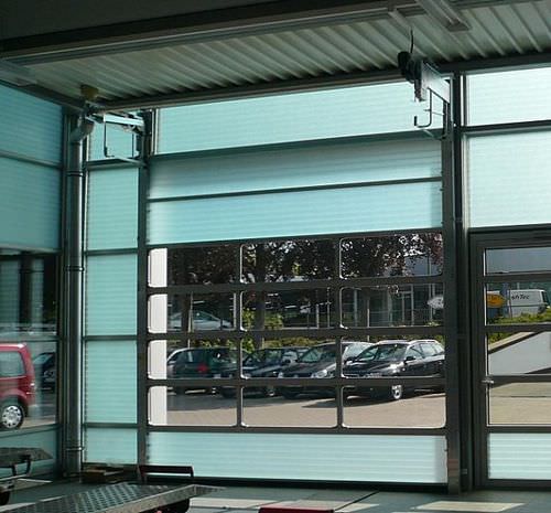 Porta industriale sezionale - SPACELITE HT  - Angel Mir – Portes Bisbal - in fibra di vetro / per l'industria agroalimentare / semivetrata