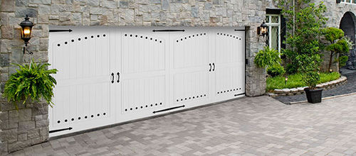 Porta battente per garage - PELLA - in vinile / in alluminio / in acciaio
