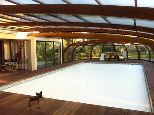 Copertura per piscina a parete - ABRISUD - in legno / con azionamento manuale