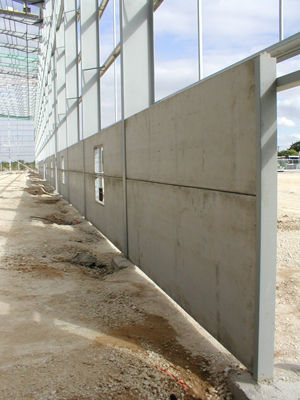 Facciata continua in pannelli - WAREHOUSE WALLS - Thomas Armstrong - in cemento armato precompresso
