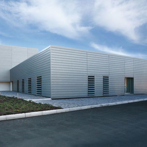 Facciata ventilata in rame - MANUTENCOOP, MESTRE - ZINTEK - in zinco titanio / in fogli / liscia