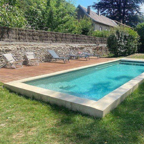 Bordo di piscina in calcestruzzo - U SILK - ROUVIERE - in pietra / d'angolo