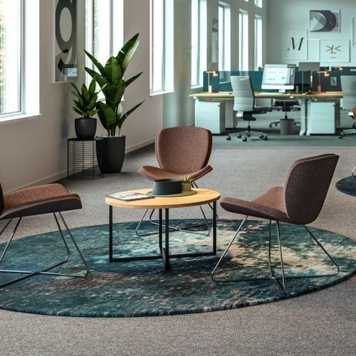 Tavolino basso contemporaneo - PESARO - ASSMANN BÜROMÖBEL GMBH & CO. KG - in legno / con supporto in metallo / rotondo