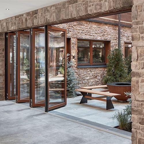 Vetrata scorrevole impilabile - NW 540 - NanaWall - a libro / con struttura in legno / a doppi vetri