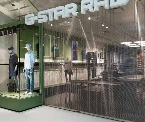 Inferriata di sicurezza ad avvolgimento - SteelWeave - Cornell - per finestra / per vetrina / in acciaio inossidabile