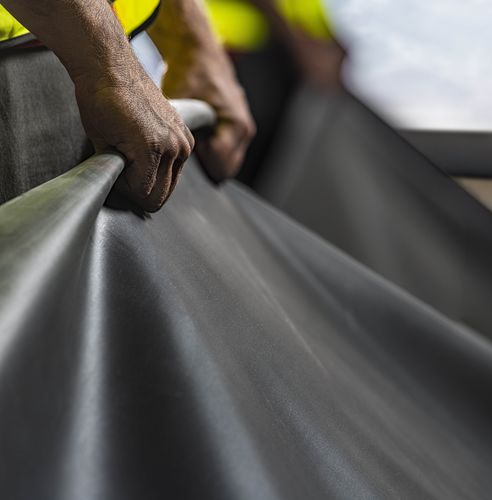 Membrana impermeabilizzante isolante - RUBBERGARD™  - Holcim Elevate - per tetti / in rotoli / flessibile