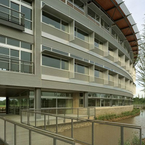 Rivestimento di facciata in pannelli - PAC-CLAD Petersen Aluminum - in lamiera / ondulato