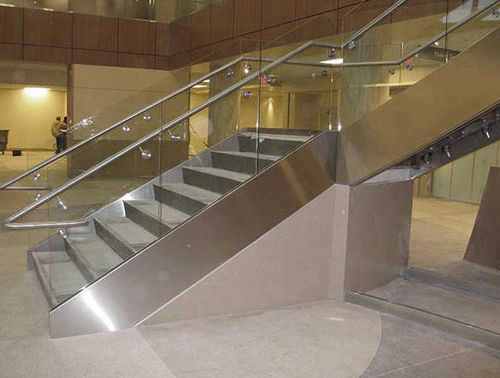 Scala a L - 43408 - Couturier Iron Craft - con gradini in calcestruzzo / con struttura in metallo / per edificio ad uso pubblico