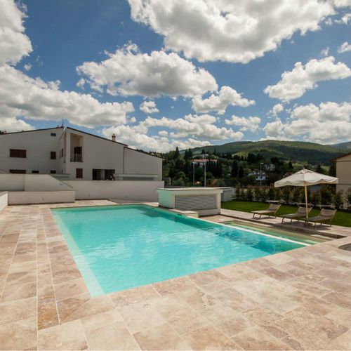 Piastrella in travertino - LEATHER BROWN - PIETRE DI RAPOLANO PDR SRL - anticata / spazzolata / da interno