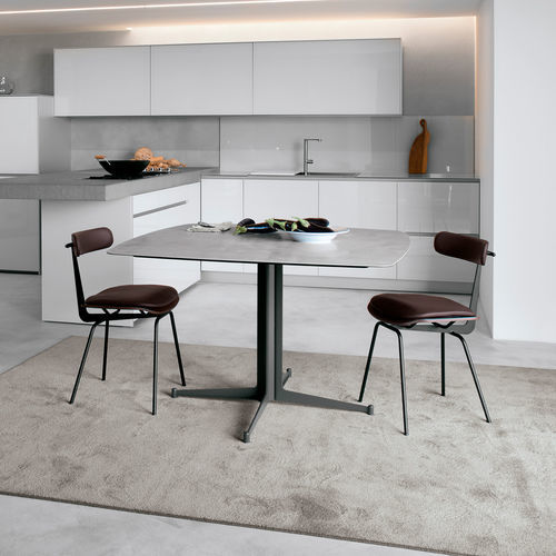 Tavolo contemporaneo - T9 - extendo - in HPL / in calcestruzzo / con supporto in acciaio inossidabile